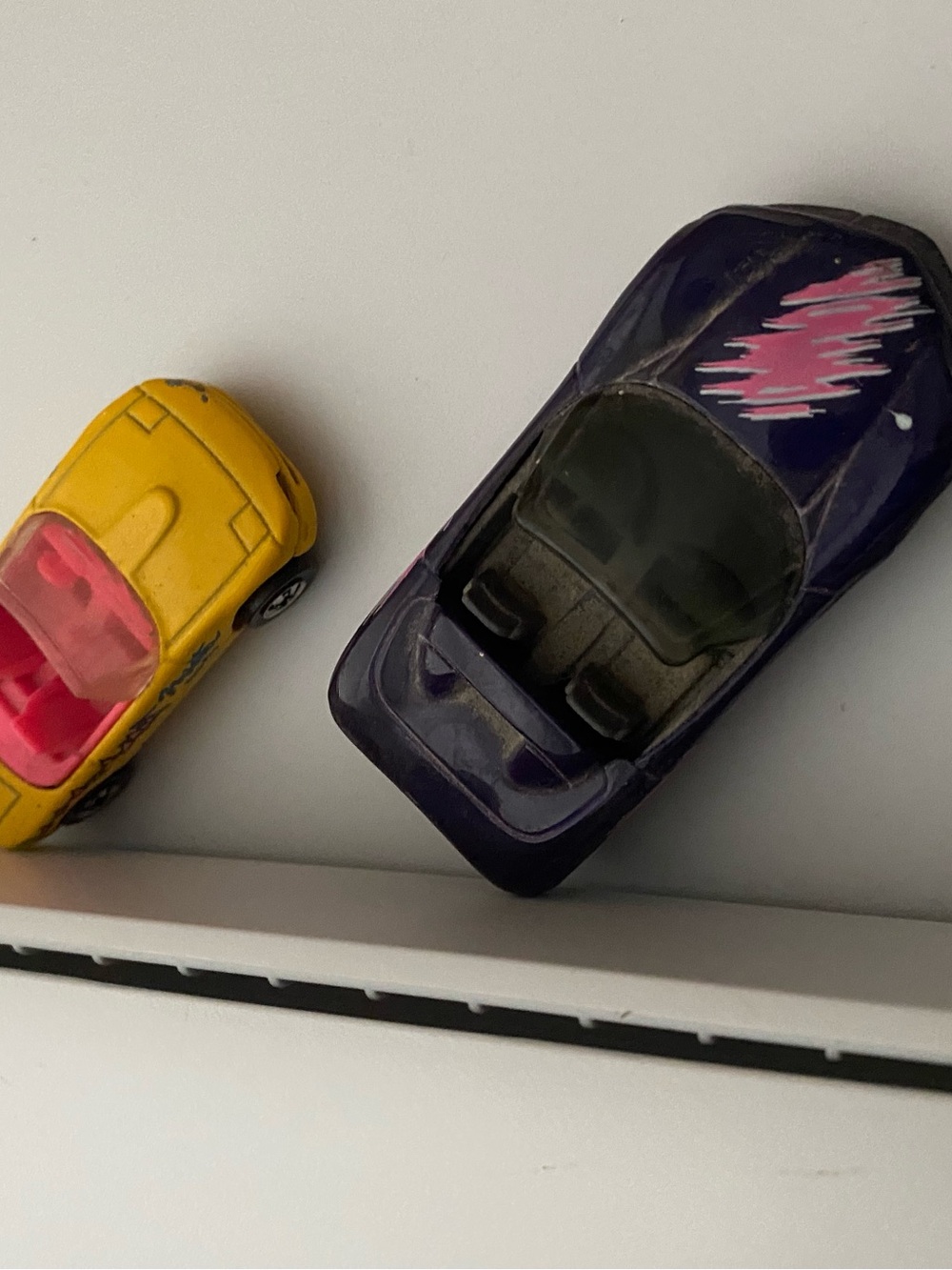 Two Toy Cars- one Corvette Stingray Matchbox, one Mattel Hotwheels, used